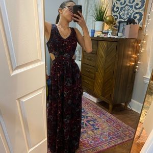 Dark long cocktail dress with side cutouts